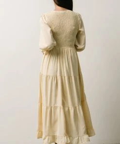 POL Dresses Tarryn Smocked Midi Dress | Light Yellow Floral
